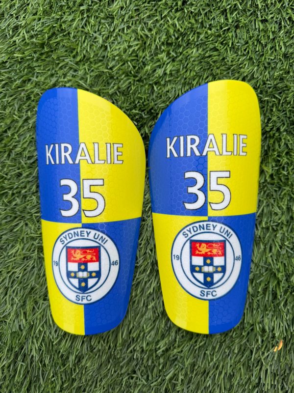 Standard personalised shin pads yellow and blue squares design