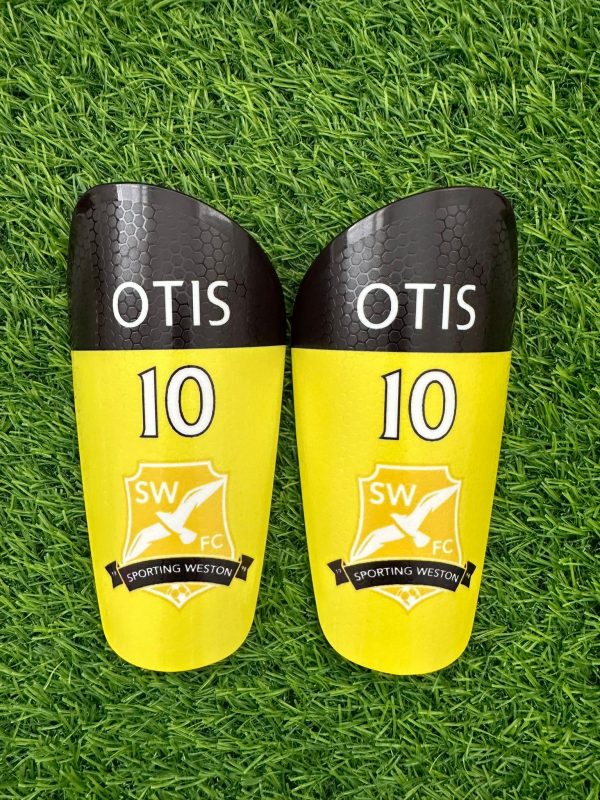 Standard personalised shin pads yellow and black with white text