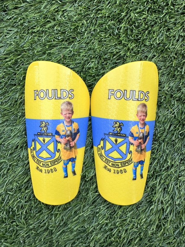 Pro personalised shin pads Ashton Athletic yellow and blue.