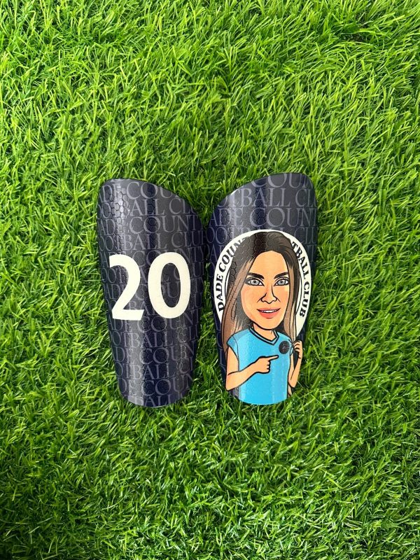 Cartoon personalised shin pads carbon black with grassroots logo