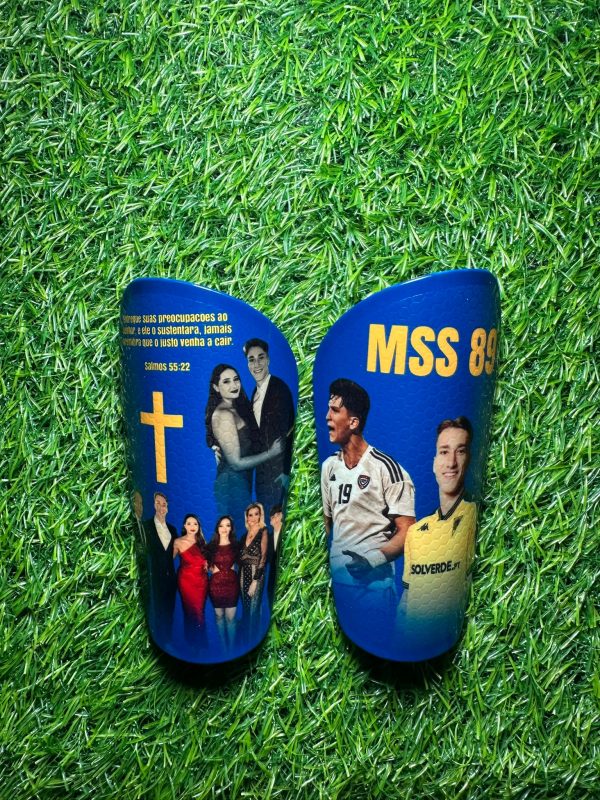 Elite personalised shin pads, Christian design with blue background and yellow text.
