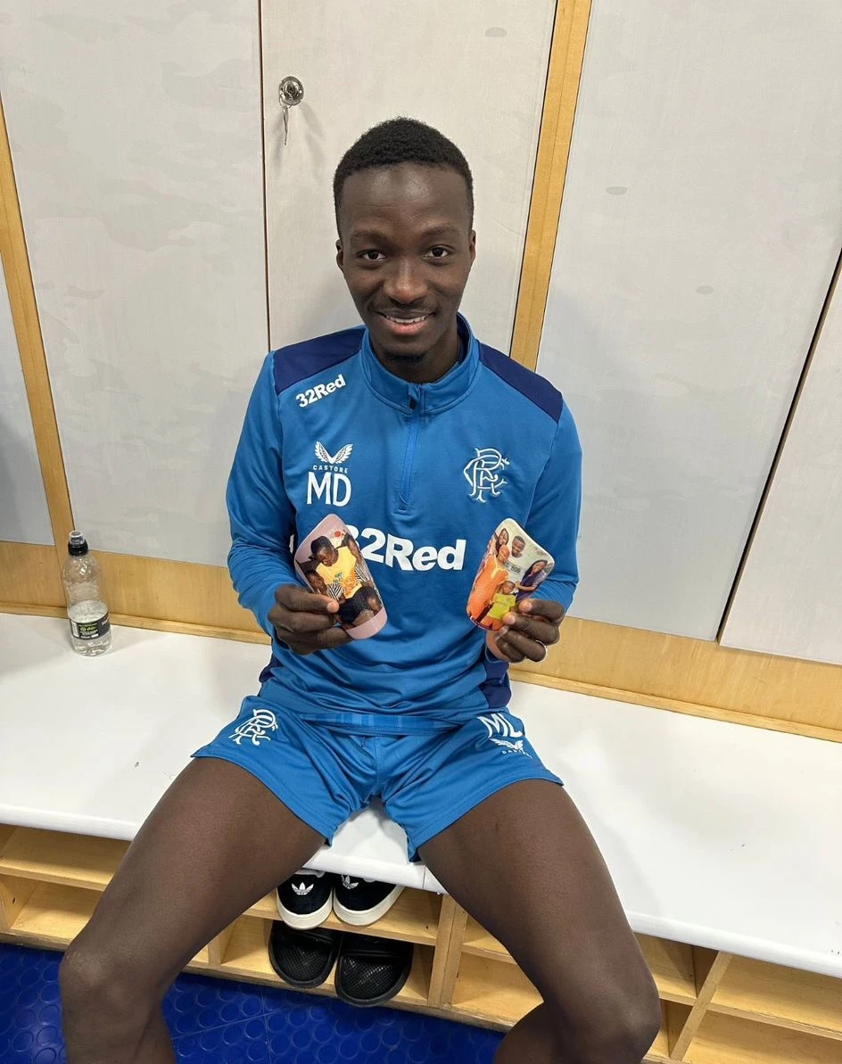 Diomande from Rangers FC with personalised shin pads
